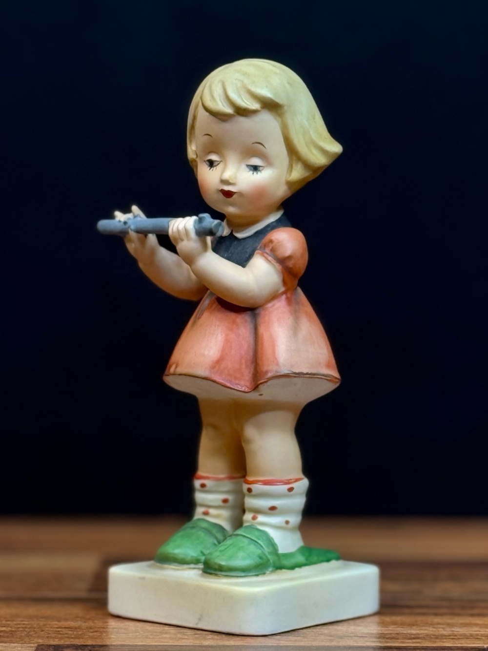Girl Playing Flute Figurine